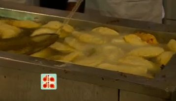 Érico Aires confere as delícias da Festa de Achiropita