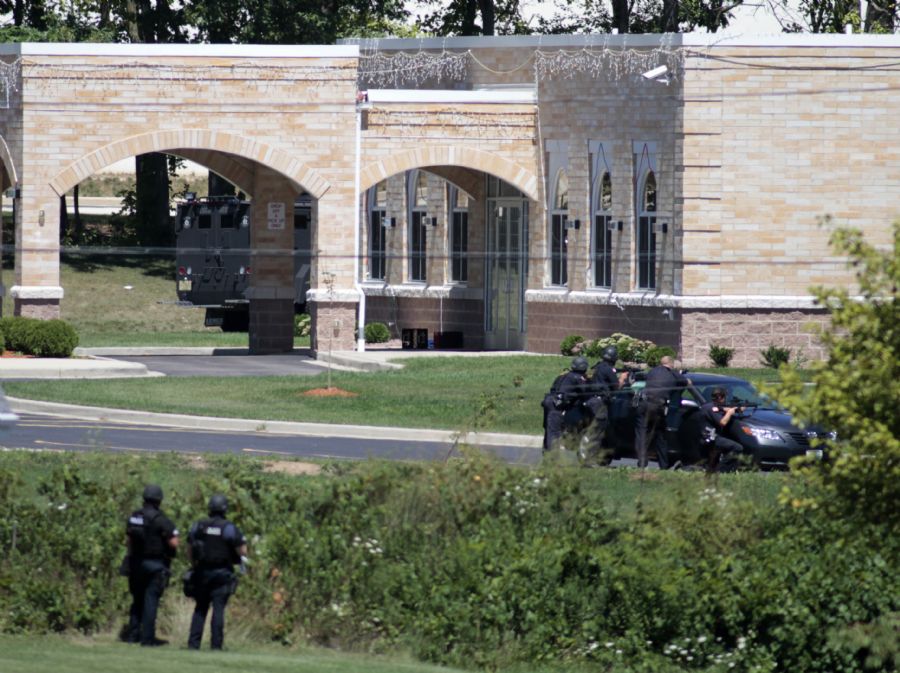 Quatro pessoas foram mortas dentro do templo e três do lado de fora do prédio / Foto: Darren Hauck / Getty Images North America / AFP