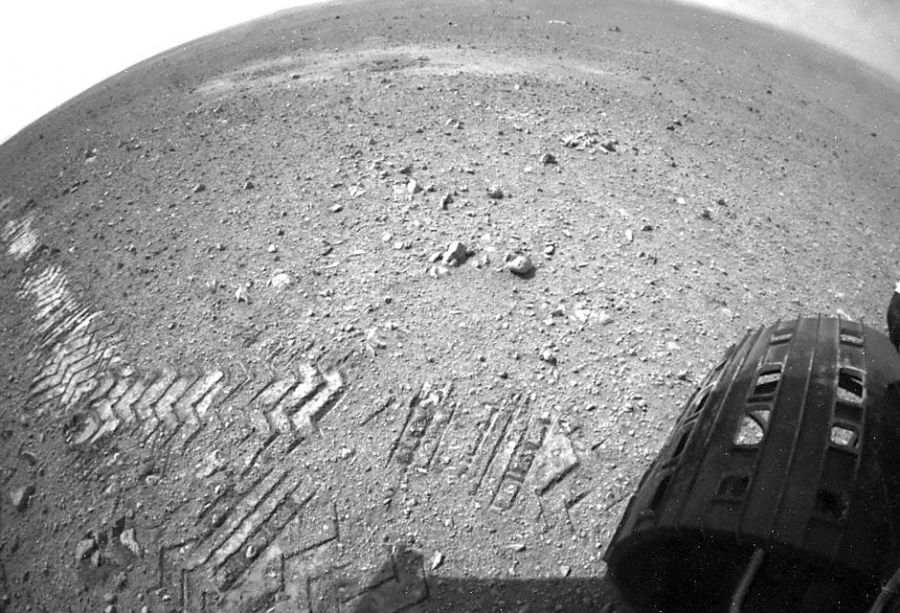 Robô Curiosity durante exploração do solo de Marte / Nasa/AFP