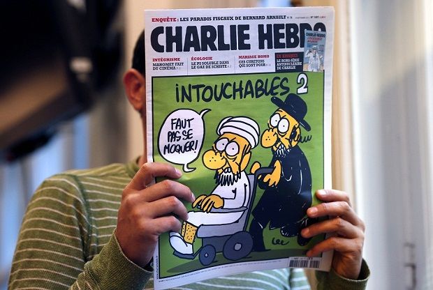 Revista francesa Charlie Hebdo publicou charges que ridicularizam o profeta Maomé / THOMAS COEX / AFP