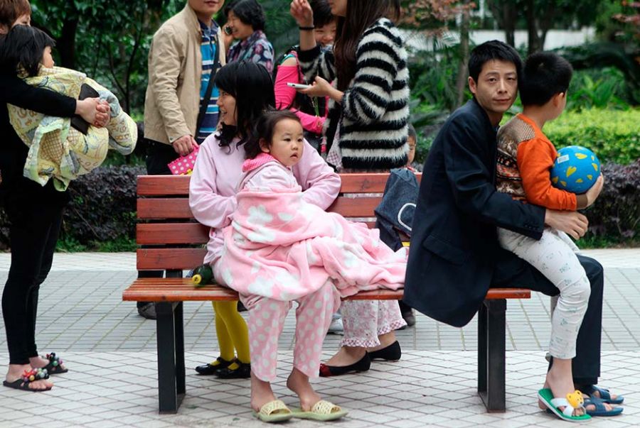 Muitos chineses tiveram que deixar suas casas de pijama