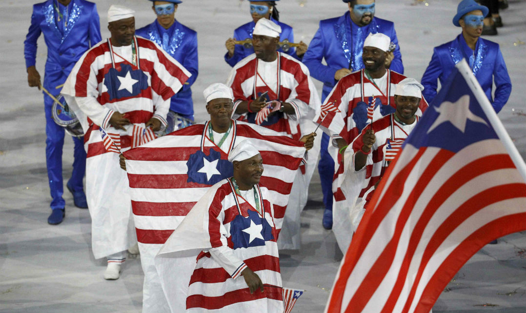 A delegação da Libéria veio literalmente vestida com a bandeira de seu país