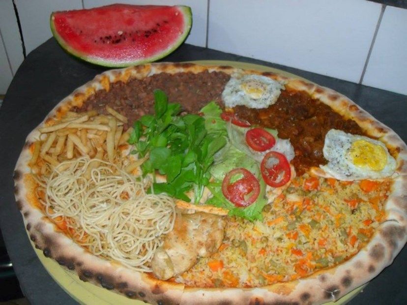 Pizza Gigante Leva Arroz E Fritas Noticias Noticias Band Com Br