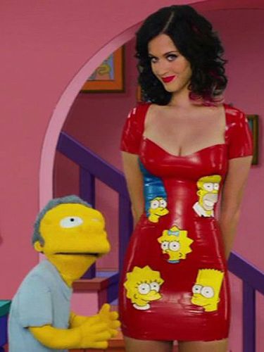 O personagem Moe ao lado da cantora Katy perry no especial de Os Simpsons