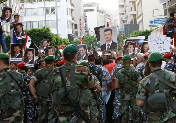 Exército quer conter revoltas em cidade síria / Foto: Anwar Amro/AFP