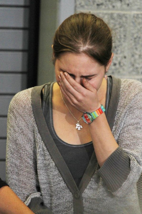 Amanda Knox chorou em seu retorno aos EUA / Kevin Casey/AFP