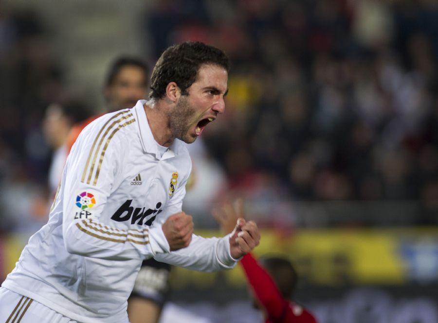 Higuaín comemora o gol de empate do Real Madrid / Jaime Reina/ AFP