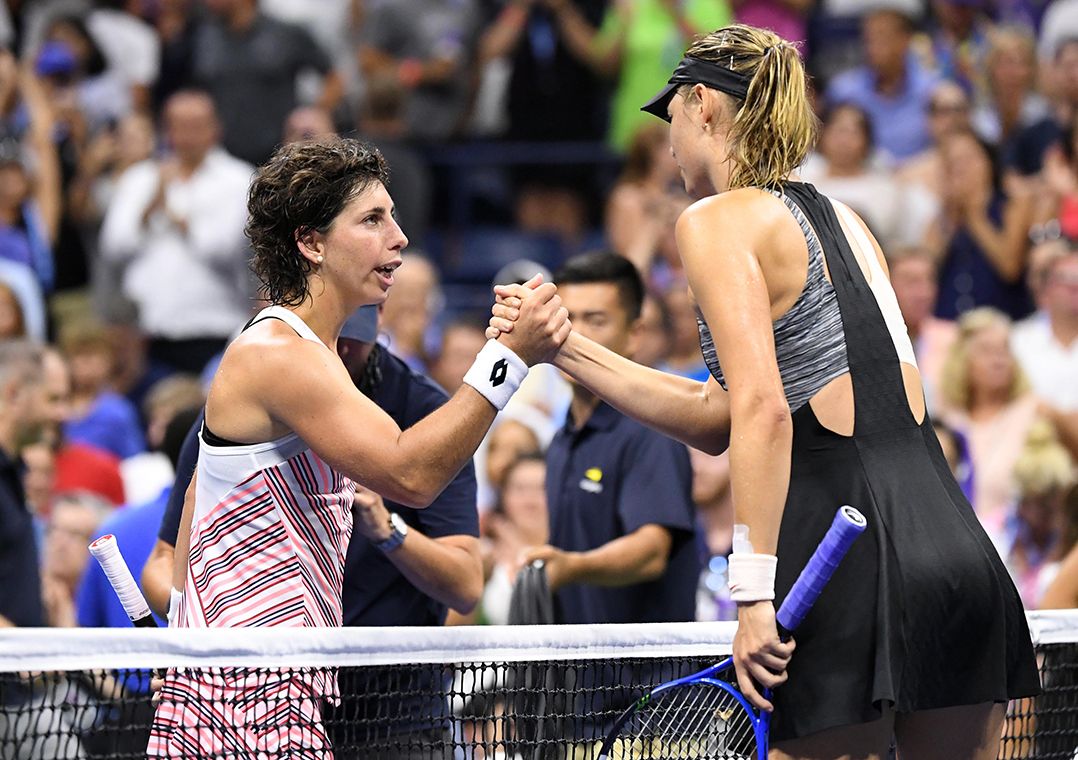 Suárez Navarro surpreende Sharapova e vai às quartas no US Open Band